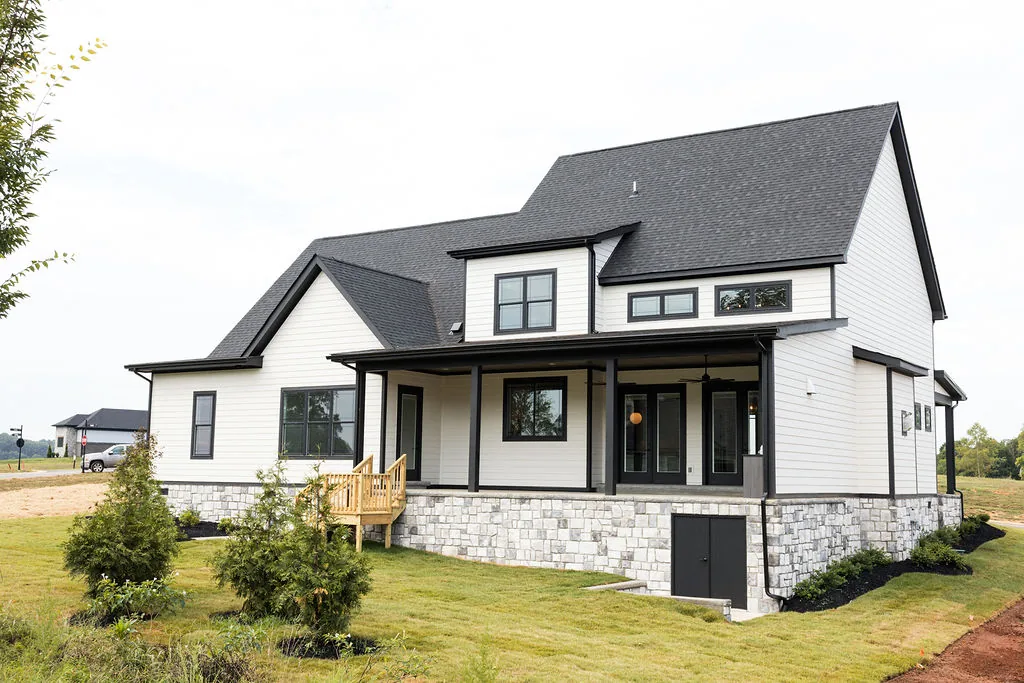 Luxury custom home exterior in East Tennessee with stone and timber accents
