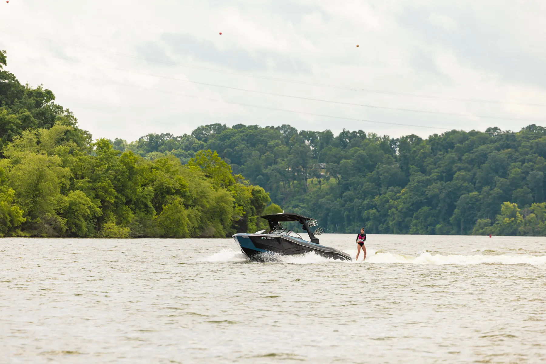 Pontoon boat cruising on the lake